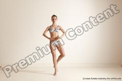 Swimsuit Gymnastic poses Woman White Moving poses Slim long brown Dynamic poses Academic